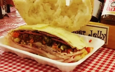 Muffaletta #slomo, courtesy of @bulldogpepperjelly…Thanks ladies! #Repost ・・・ @calandrosmkt muffaletta topped with Roasted Garlic Bulldog…